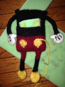 In the process of needle-felting the buttons.